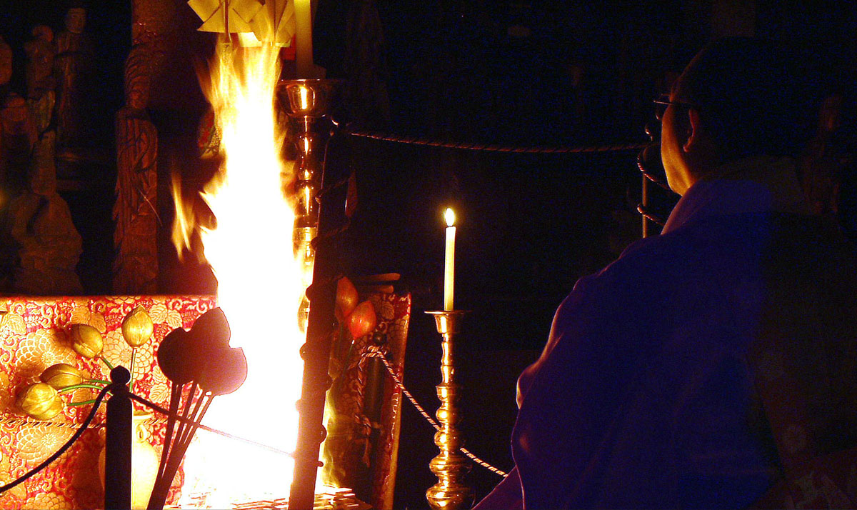 New Year's Day prayer.  Prayers are solemnly offered to worshippers in the hall.
