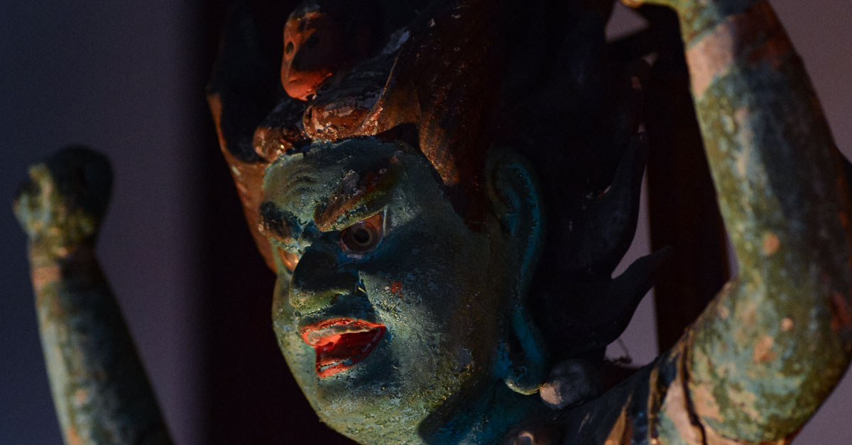 A monkey mask on his head.