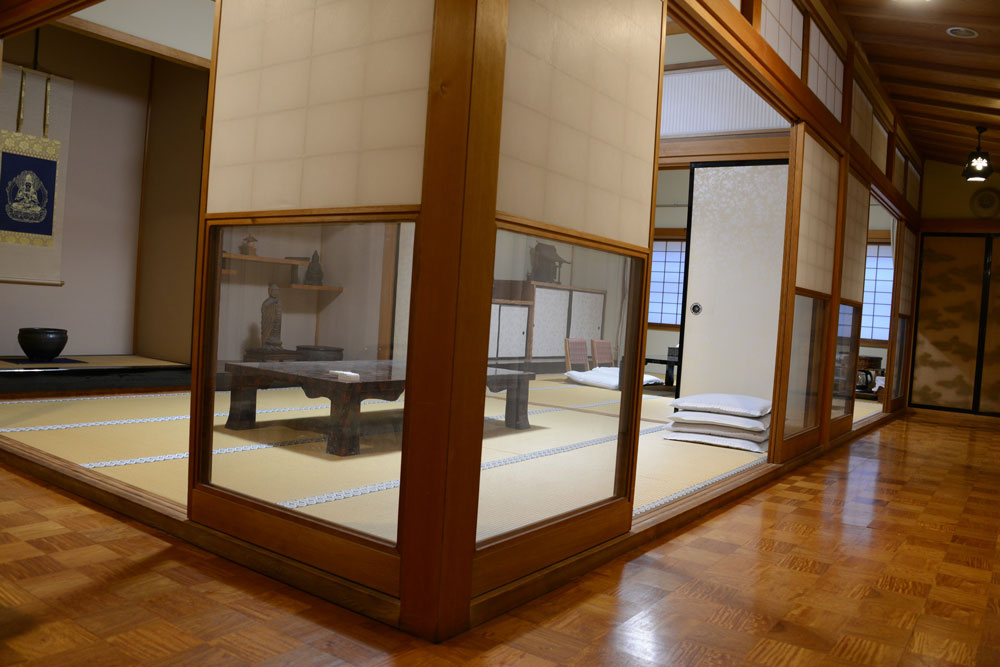 Sliding yukimi shoji (a door made with a lattice frame covered with translucent paper with the lower half made of glass)