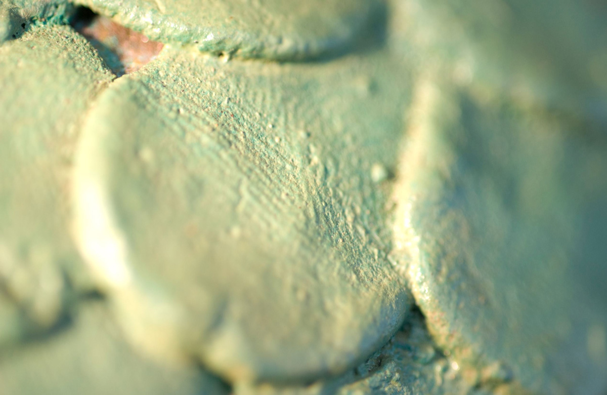 The statue is made of bronze and woven with beeswax work